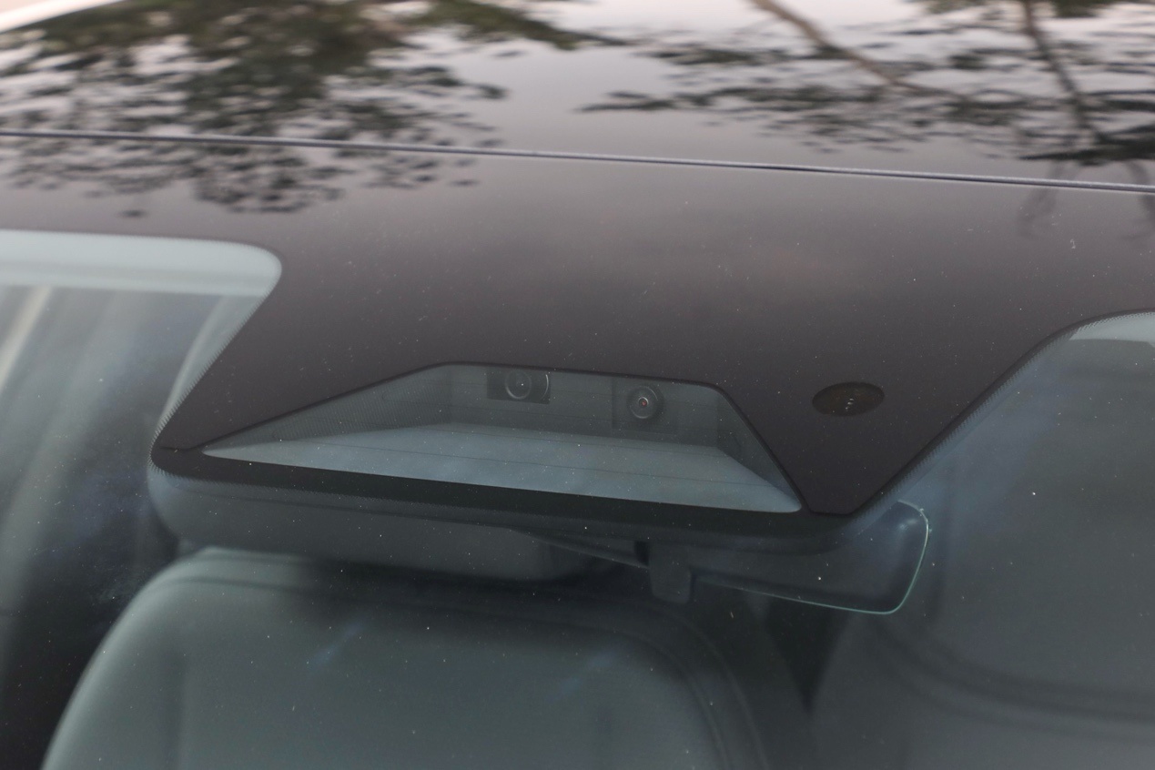 On the car seatDescription has been automatically generated.